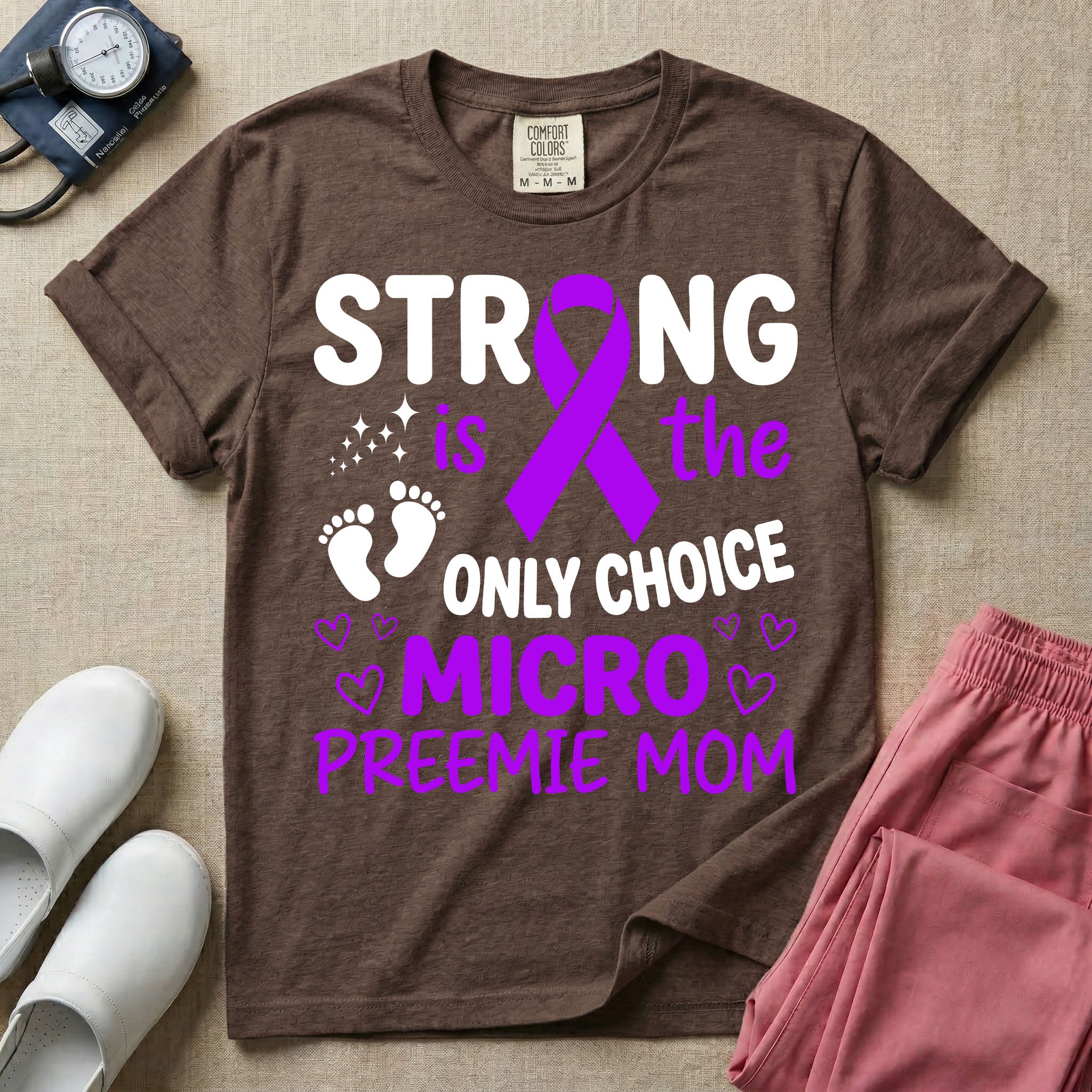 A graphic for the Neonatal Intensive Care Unit featuring the text 'STRONG is the ONLY CHOICE' stacked above 'MICRO PREEMIE MOM', incorporating a large purple awareness ribbon, tiny baby footprints, and small purple outline hearts.