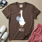 A t-shirt featuring an illustration of a white silly goose wearing a nurse's cap and holding a baby goose swaddled in a blue blanket, with the text NICU printed below.