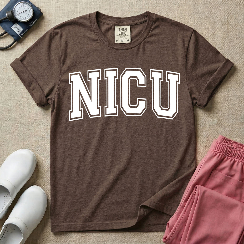 A minimalist graphic for the Neonatal Intensive Care Unit featuring the word 'NICU' printed in large, white, collegiate-style block letters across the chest.