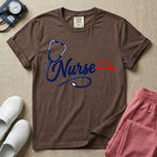 General nursing t-shirt with a minimalist cursive Nurse text integrated with a navy blue stethoscope and a red heartbeat graphic.