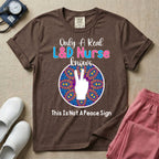 A humorous Labor and Delivery nurse graphic featuring a hand holding up two fingers inside a colorful boho mandala pattern, surrounded by text that reads Only A Real L&D Nurse Knows above and This Is Not A Peace Sign below.