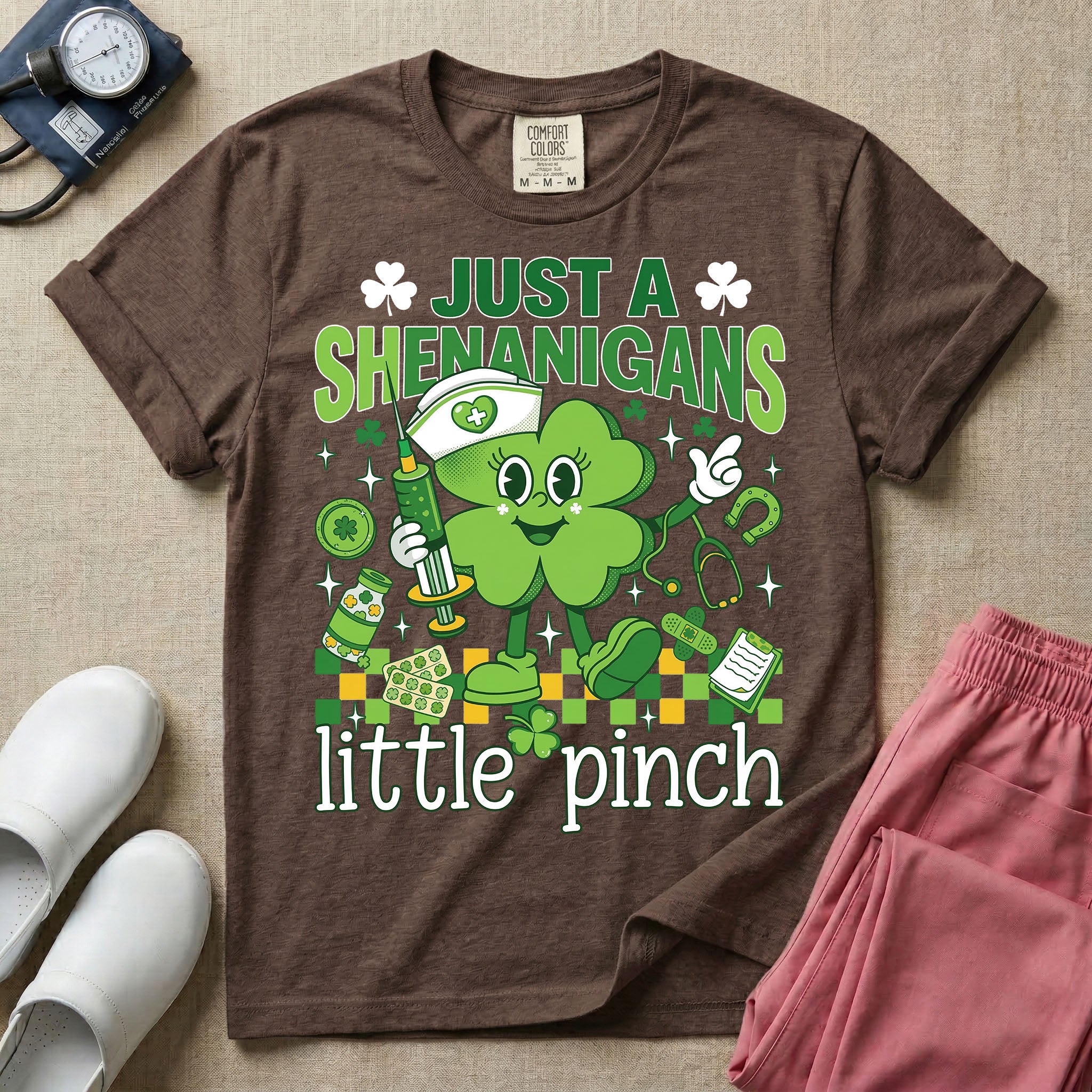 General nursing nurse t-shirt with a retro clover just a shenanigans little pinch graphic in espresso color.