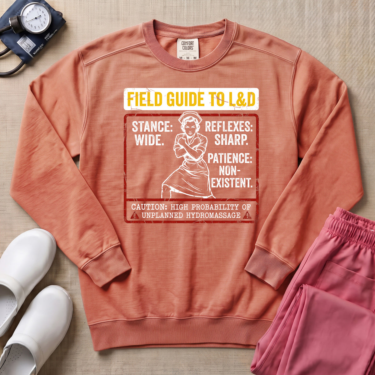 Funny Field Guide To L&D Retro Nurse Sweatshirt - Terracotta Comfort Colors Sweatshirt | HugTee