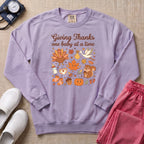 Retro Giving Thanks One Baby At A Time Thanksgiving L&D and NICU Nurse Sweatshirt - Orchid Comfort Colors Sweatshirt | HugTee