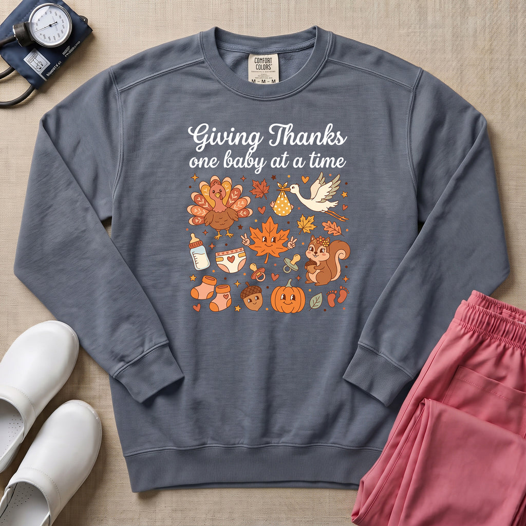Retro Giving Thanks One Baby At A Time Thanksgiving L&D and NICU Nurse Sweatshirt - Blue Jean Comfort Colors Sweatshirt | HugTee