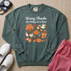 Retro Giving Thanks One Baby At A Time Thanksgiving L&D and NICU Nurse Sweatshirt - Blue Spruce Comfort Colors Sweatshirt | HugTee