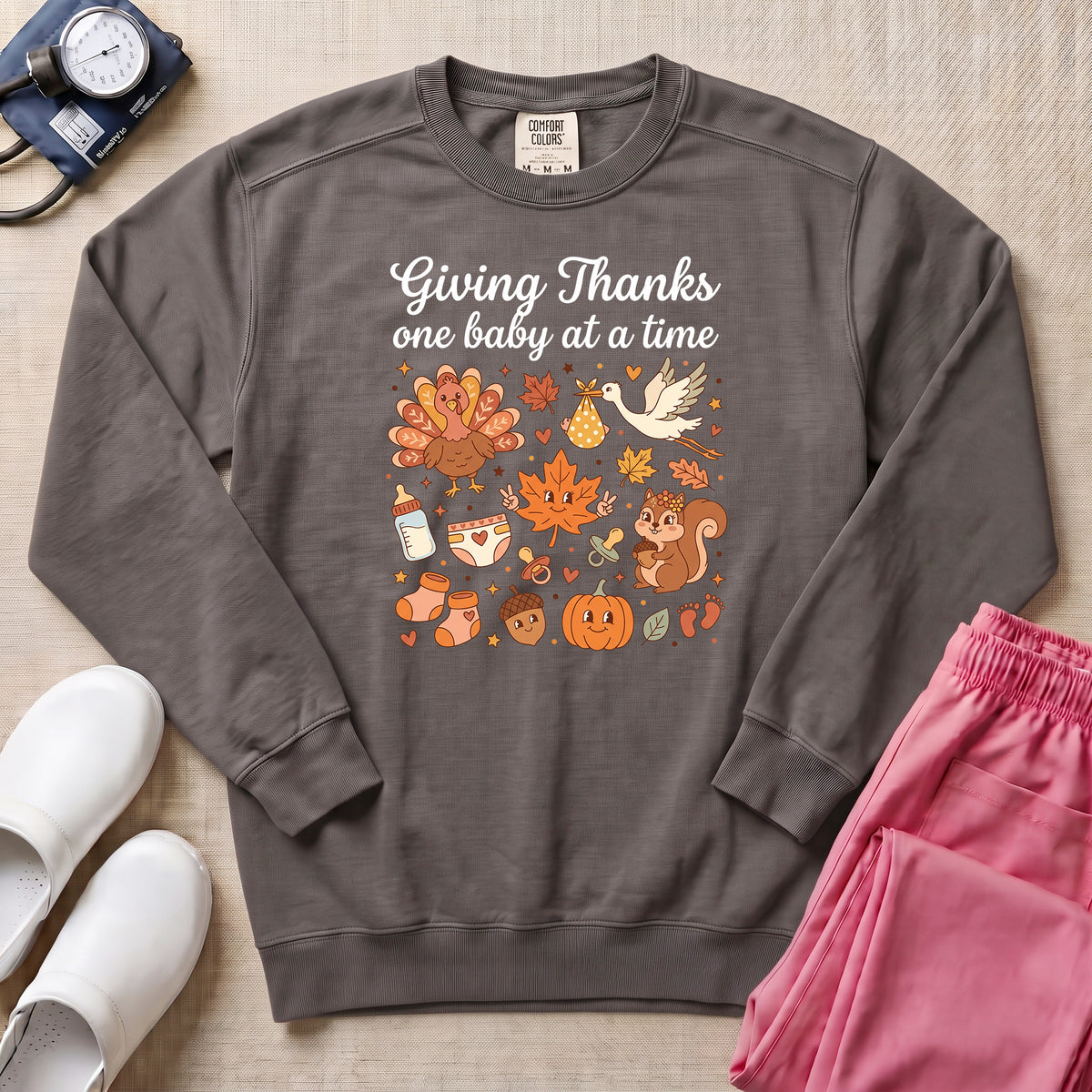 Retro Giving Thanks One Baby At A Time Thanksgiving L&D and NICU Nurse Sweatshirt - Pepper Lifestyle Hero Mockup | HugTee