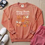 Retro Giving Thanks One Baby At A Time Thanksgiving L&D and NICU Nurse Sweatshirt - Terracotta Comfort Colors Sweatshirt | HugTee