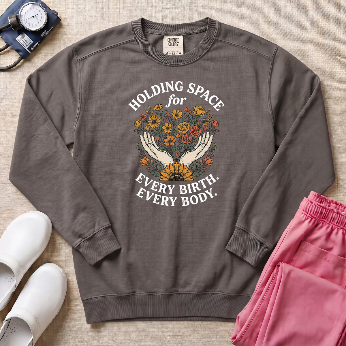 Holding Space For Every Birth Every Body L&D Nurse Doula Sweatshirt - Pepper Lifestyle Hero Mockup | HugTee
