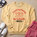 I Teach Tiny Humans How To Breathe NICU Sweatshirt - Butter Comfort Colors Sweatshirt | HugTee