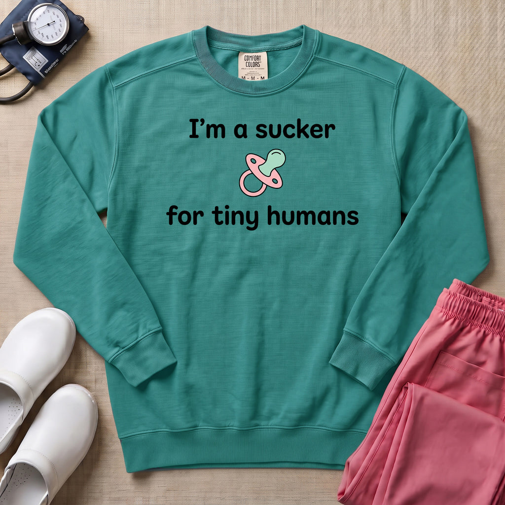 I'm A Sucker For Tiny Humans Funny Pediatric NICU Nurse Sweatshirt - Seafoam Comfort Colors Sweatshirt | HugTee