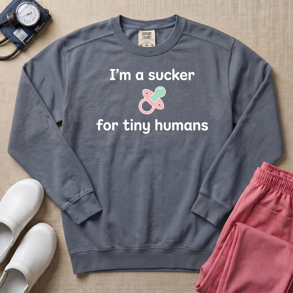 I'm A Sucker For Tiny Humans Funny Pediatric NICU Nurse Sweatshirt - Blue Jean Comfort Colors Sweatshirt | HugTee