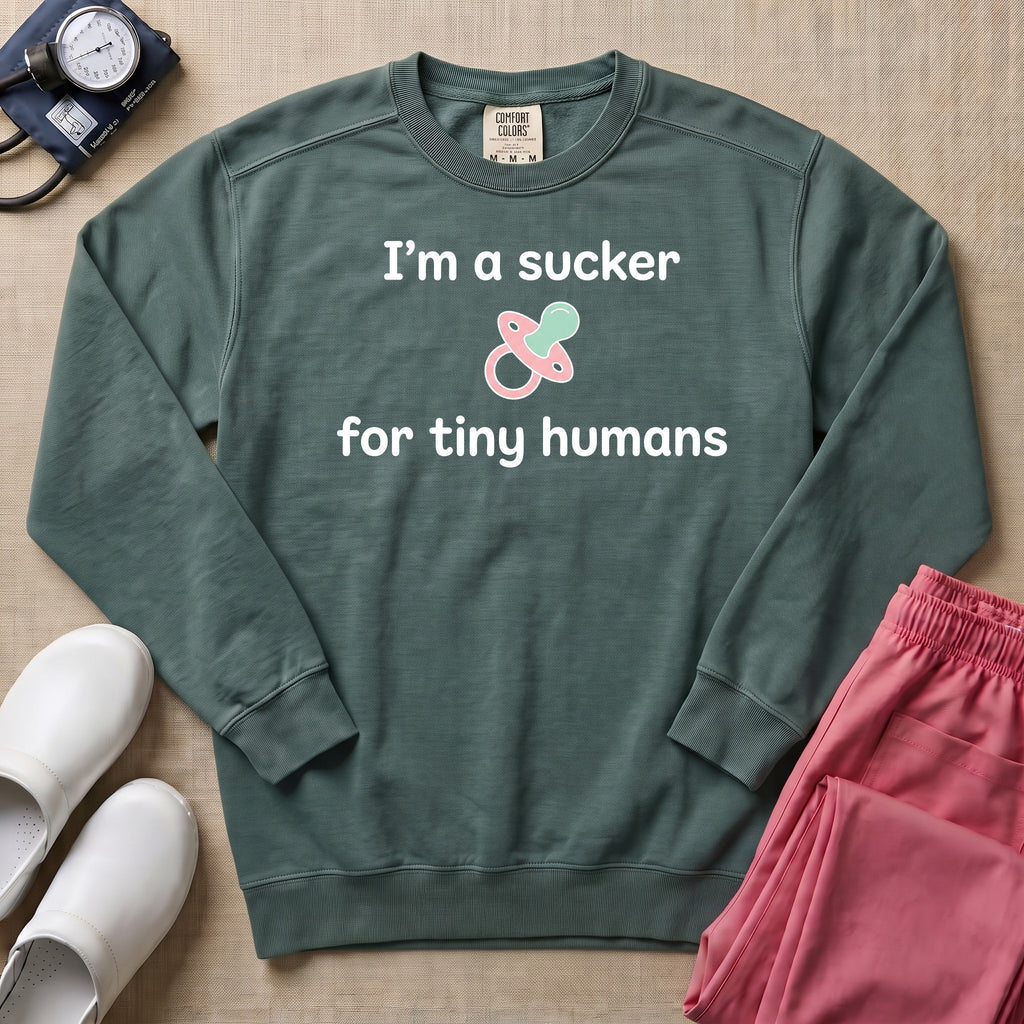 I'm A Sucker For Tiny Humans Funny Pediatric NICU Nurse Sweatshirt - Blue Spruce Comfort Colors Sweatshirt | HugTee