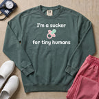I'm A Sucker For Tiny Humans Funny Pediatric NICU Nurse Sweatshirt - Blue Spruce Comfort Colors Sweatshirt | HugTee