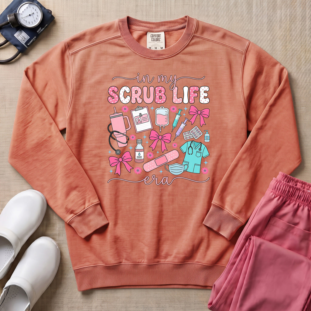 In My Scrub Life Era Coquette Nurse Sweatshirt - Terracotta Comfort Colors Sweatshirt | HugTee