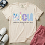 Neonatal Intensive Care Unit NICU nurse t-shirt with boho floral block letters in ivory color.