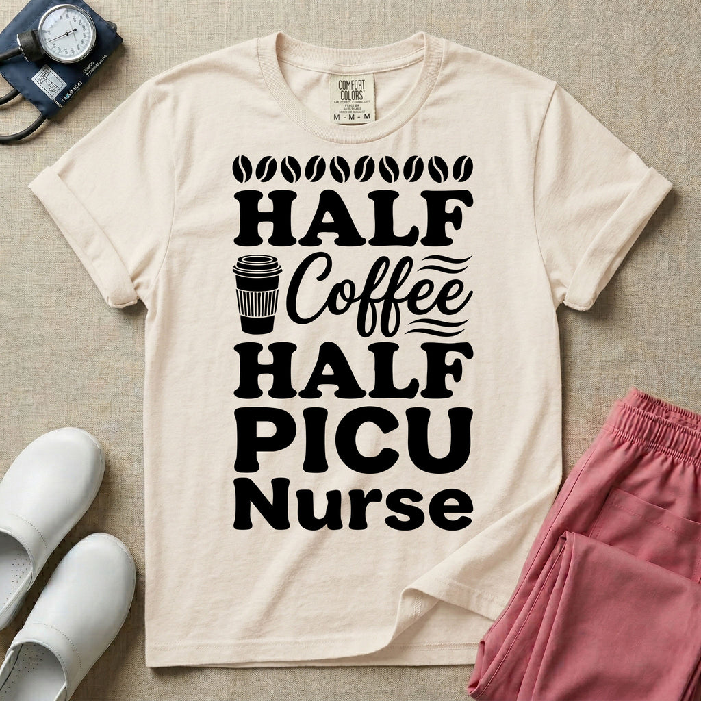 A funny pediatric intensive care nursing t-shirt featuring the stacked white text "HALF COFFEE HALF PICU Nurse" accented with simple graphics of coffee beans and a to-go coffee cup.