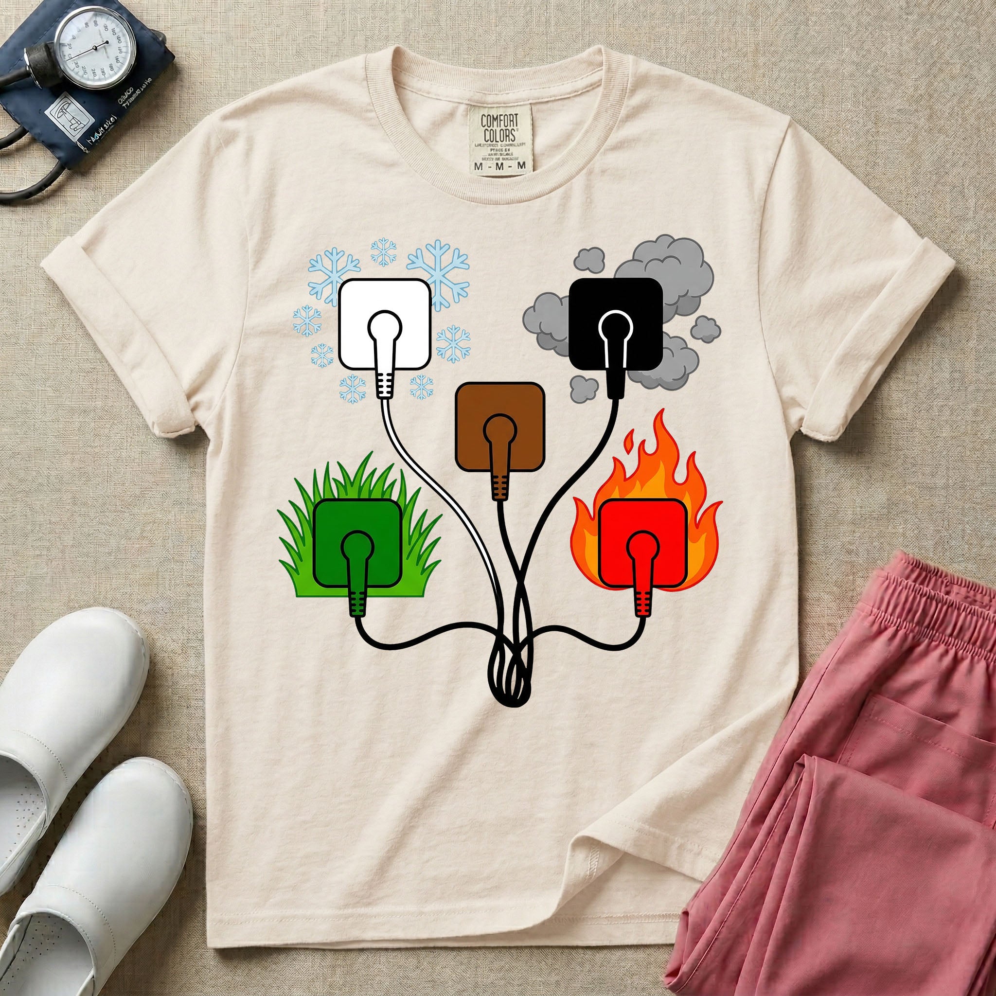A minimalist t-shirt for nurses featuring an ECG lead placement mnemonic graphic with five connected electrical plugs, illustrating white snow over green grass, black smoke over red fire, and a central brown plug.