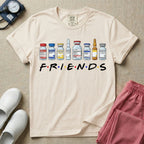 A humorous retro-style t-shirt for nurses featuring a row of seven different medical vials and medicine ampules lined up above the word "FRIENDS", which is styled with colored dots between the letters to resemble the classic television show logo.
