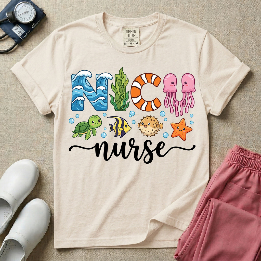 A cute t-shirt for NICU nurses featuring the text "NICU nurse" where the letters are designed with ocean elements like waves, seaweed, and a jellyfish, surrounded by under the sea creatures including a sea turtle, tropical fish, pufferfish, and starfish.