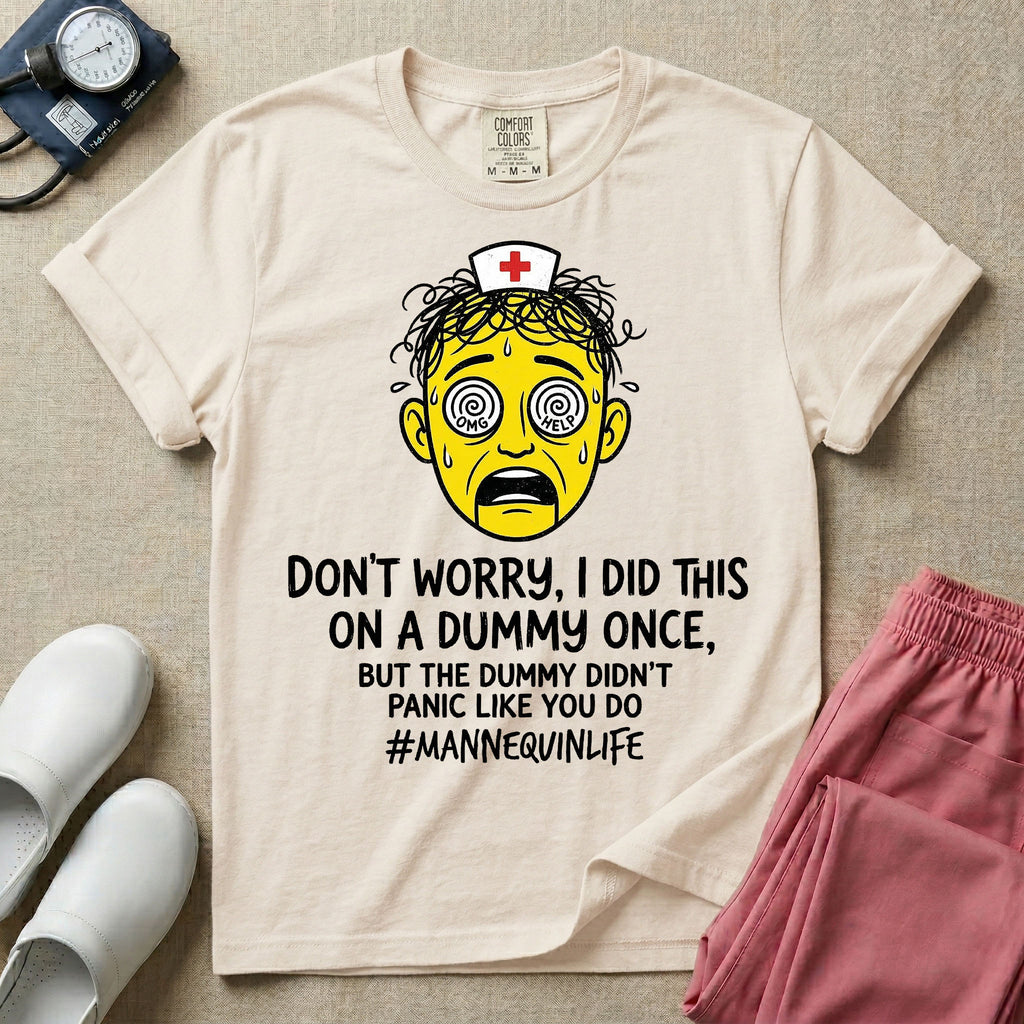 General nursing nurse t-shirt with a funny don't worry I did this on a mannequin once but the dummy didn't panic like you do graphic in ivory color.