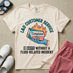 Labor and Delivery L&D nurse t-shirt with funny customer service burning complaint box and zero days without a fluid-related incident graphic in ivory color.