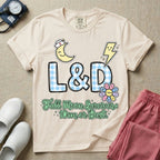 Labor and Delivery L&D nurse t-shirt with a retro full moon energies mom or bust graphic in ivory color.