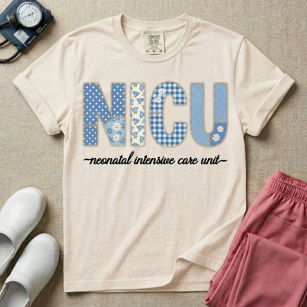 A t-shirt for NICU nurses featuring the large text "NICU" designed to look like faux embroidery with floral and plaid patterns, and the words "neonatal intensive care unit" written in a delicate script font underneath.