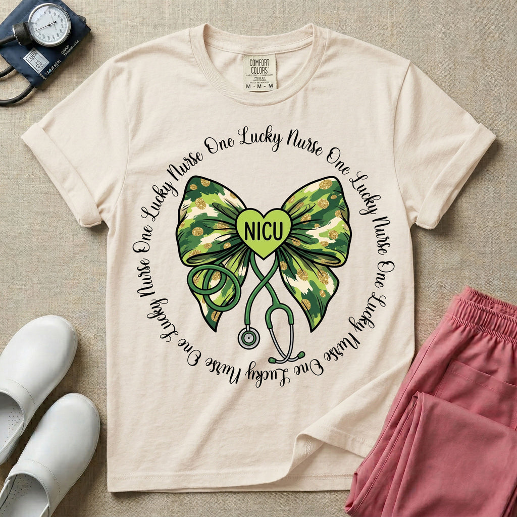 A graphic for a Neonatal Intensive Care Unit featuring a green camouflage bow with a stethoscope dangling from the bottom, a green heart in the center reading 'NICU', and the phrase 'One Lucky Nurse' repeating in a circle around the design.