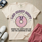 Labor and Delivery L&D night shift nurse t-shirt with a funny retro donut graphic where the spirits are low and the crowning is high in ivory color.