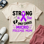 A graphic for the Neonatal Intensive Care Unit featuring the text 'STRONG is the ONLY CHOICE' stacked above 'MICRO PREEMIE MOM', incorporating a large purple awareness ribbon, tiny baby footprints, and small purple outline hearts.