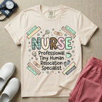 A humorous graphic for labor and delivery, postpartum, and neonatal nurses featuring the word 'NURSE' in large, mismatched patterned letters including leopard print and florals, stacked above the phrase 'Professional Tiny Human Relocation Specialist', and surrounded by cute doodles of decorated bandaids, baby footprints, a rattle, and a coffee mug.