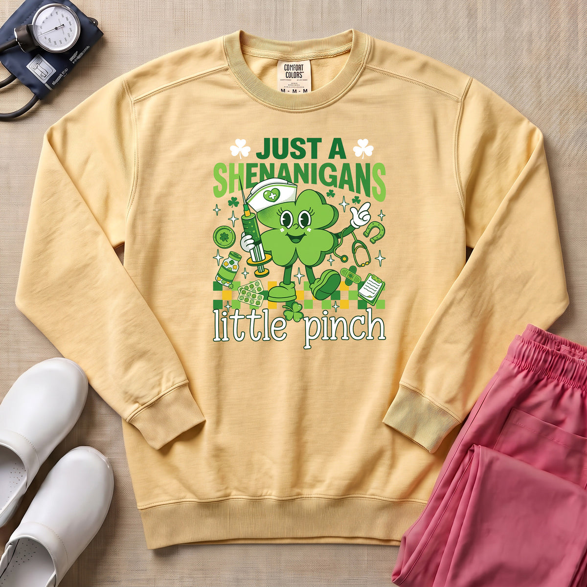 Funny Retro St. Patrick's Day Little Pinch Nurse Sweatshirt - Butter Comfort Colors Sweatshirt | HugTee