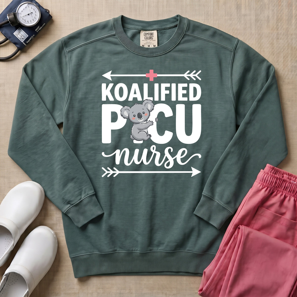 Koalified PICU Nurse Funny Sweatshirt - Blue Spruce Comfort Colors Sweatshirt | HugTee