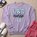 L&D Nurse Blue Gingham Footprints Sweatshirt - Orchid Comfort Colors Sweatshirt | HugTee