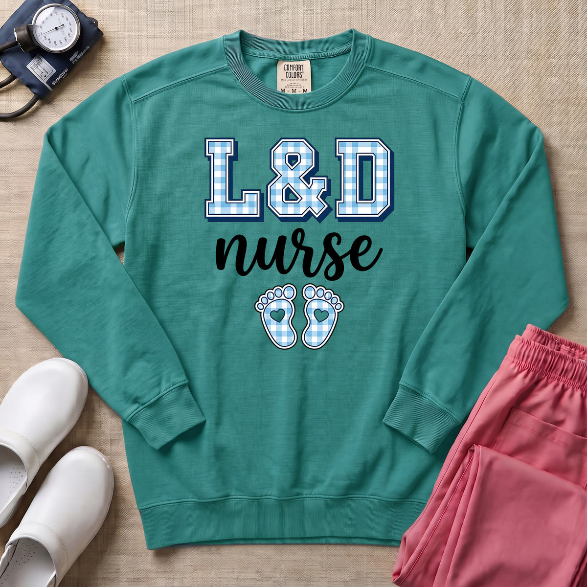 L&D Nurse Blue Gingham Footprints Sweatshirt - Seafoam Comfort Colors Sweatshirt | HugTee