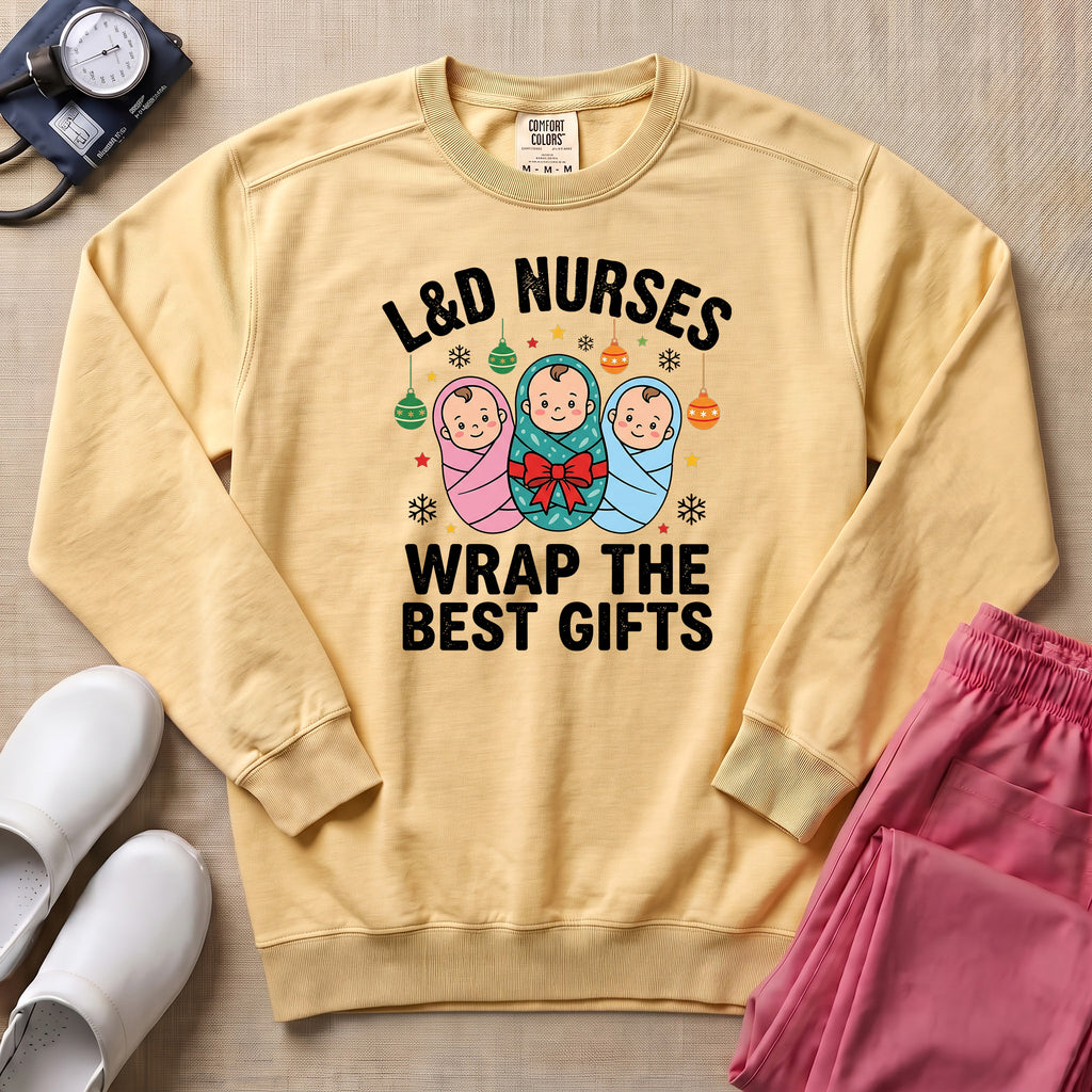 L&D Nurses Wrap The Best Gifts Christmas Sweatshirt - Butter Comfort Colors Sweatshirt | HugTee