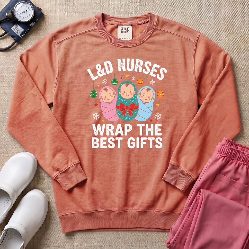 L&D Nurses Wrap The Best Gifts Christmas Sweatshirt - Terracotta Comfort Colors Sweatshirt | HugTee