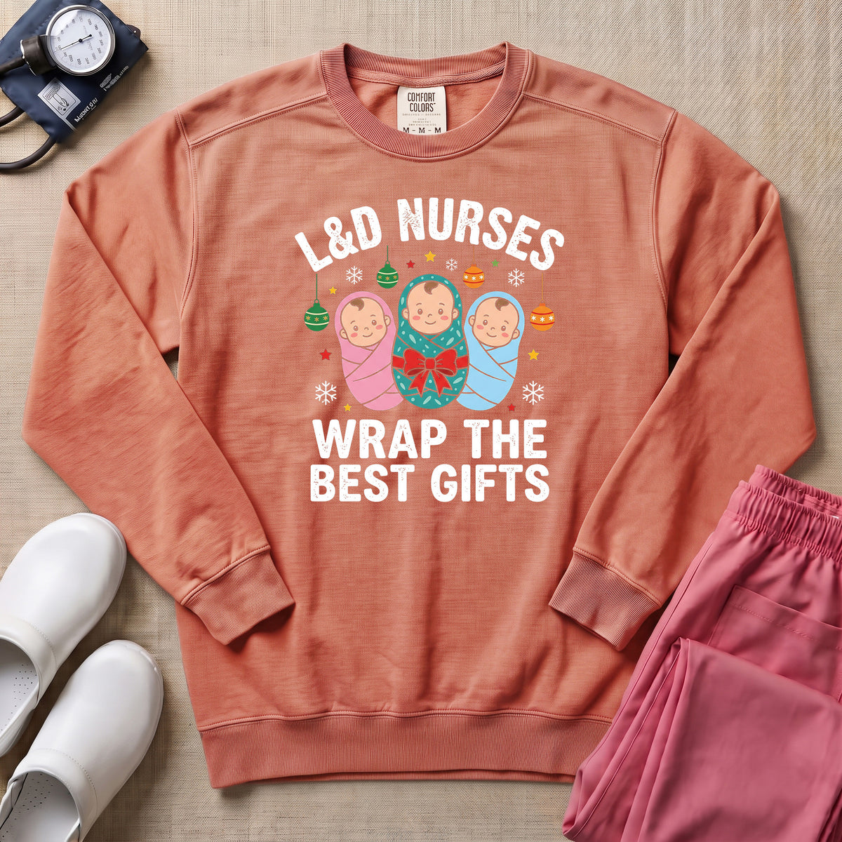 L&D Nurses Wrap The Best Gifts Christmas Sweatshirt - Terracotta Comfort Colors Sweatshirt | HugTee