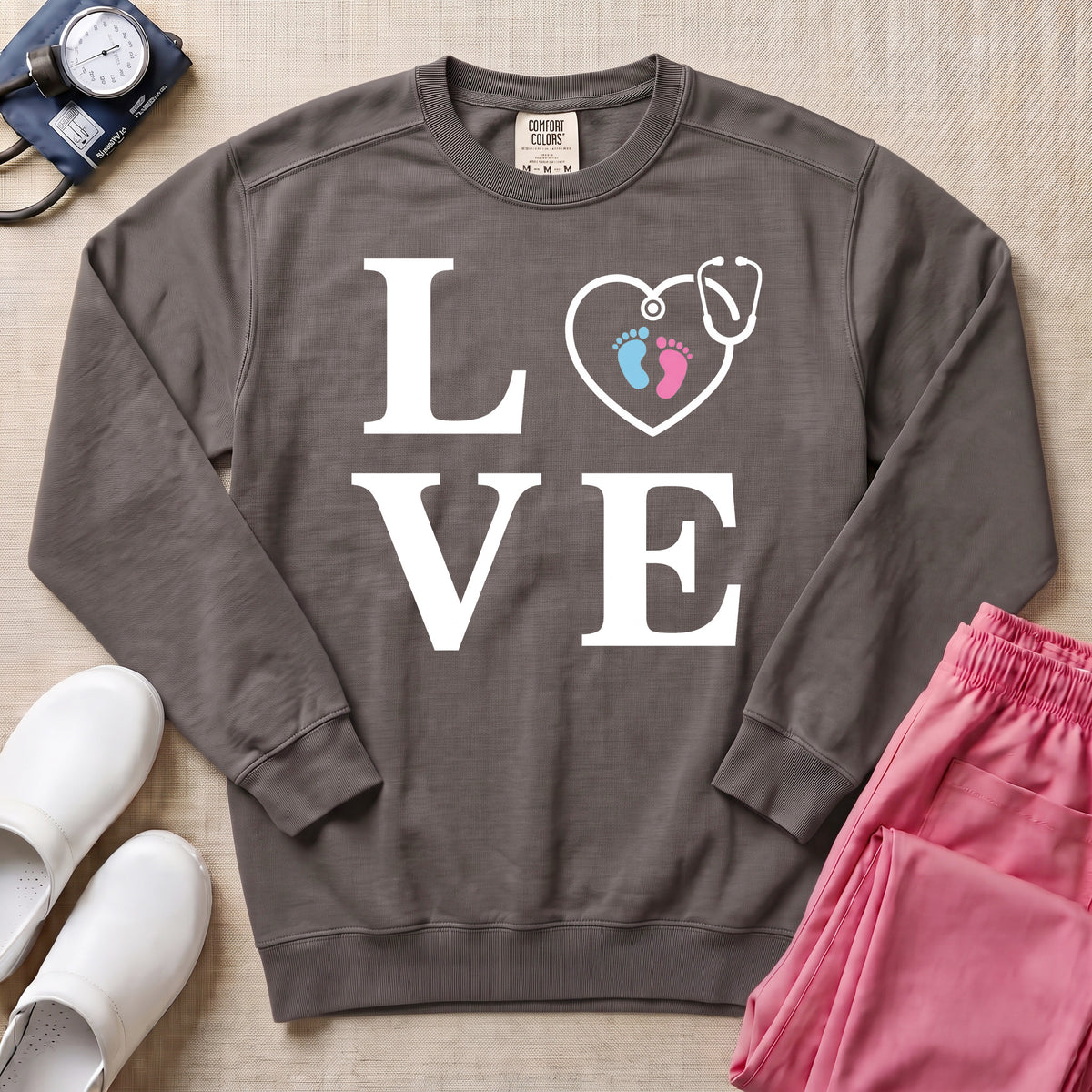 LOVE Stethoscope Baby Footprints L&D Nurse Sweatshirt - Pepper Lifestyle Hero Mockup | HugTee