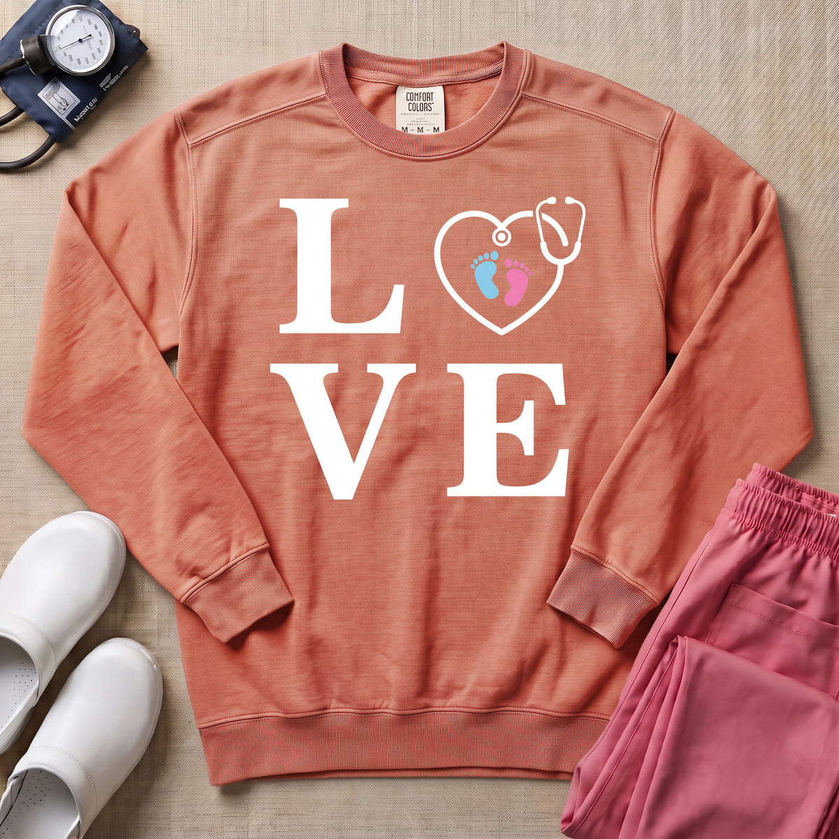 LOVE Stethoscope Baby Footprints L&D Nurse Sweatshirt - Terracotta Comfort Colors Sweatshirt | HugTee
