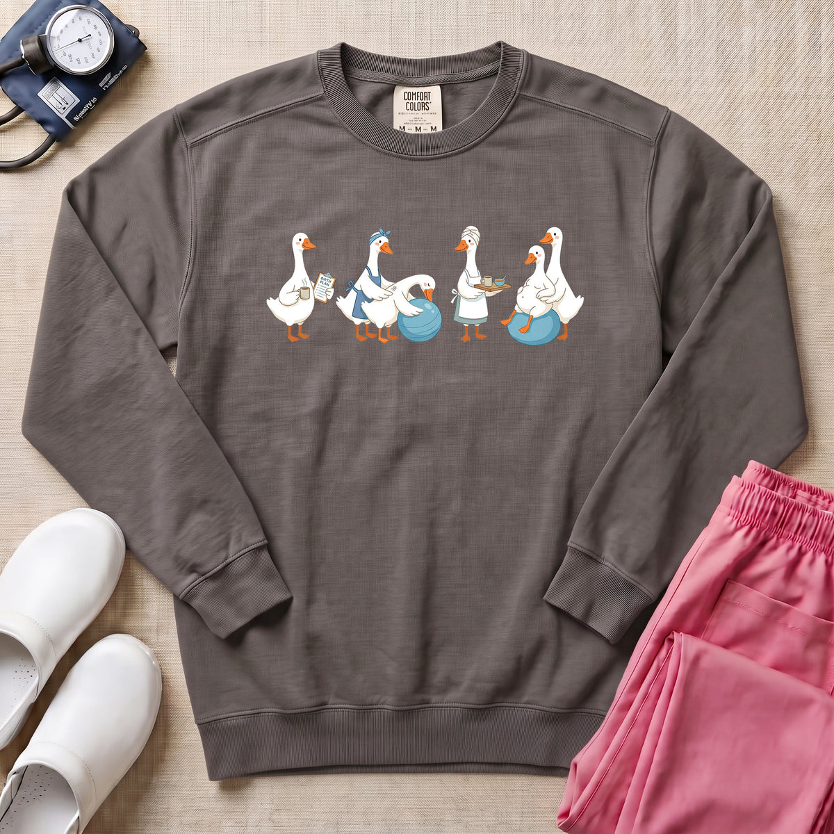 Funny Labor and Delivery Goose L&D Midwife Sweatshirt - Pepper Lifestyle Hero Mockup | HugTee