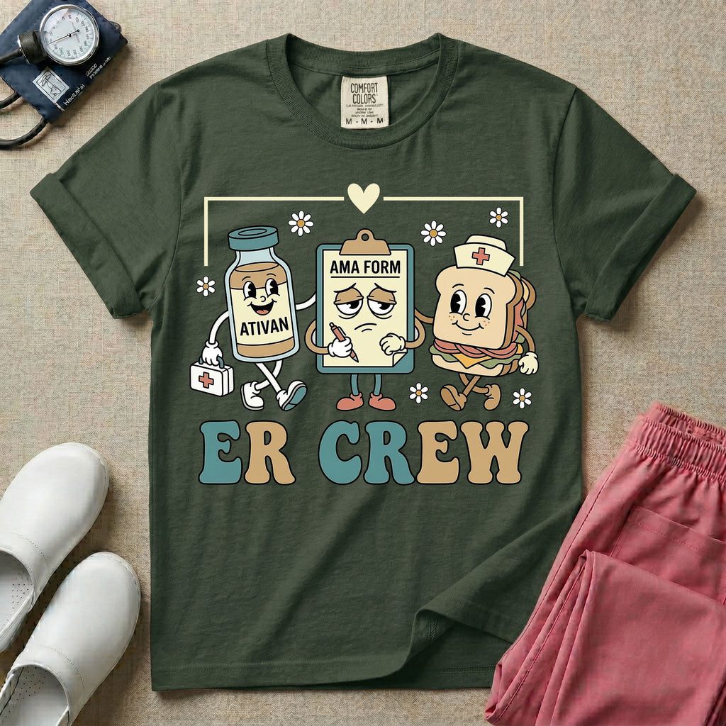 A retro-style t-shirt for emergency room nurses featuring the text "ER CREW" below a vintage cartoon illustration of a medicine bottle, a grumpy clipboard holding an AMA form, and a sandwich wearing a nurse cap walking together.