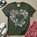 General nursing t-shirt featuring a heart-shaped stethoscope design intertwined with pink flowers and the cursive text "nurse".