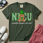 A graphic for a Neonatal Intensive Care Unit featuring the word 'NICU' in green and white plaid patterned letters, with a cute brown teddy bear wearing a leprechaun hat and holding a shamrock sitting in the middle, and the cursive text 'neonatal intensive care unit' underneath.