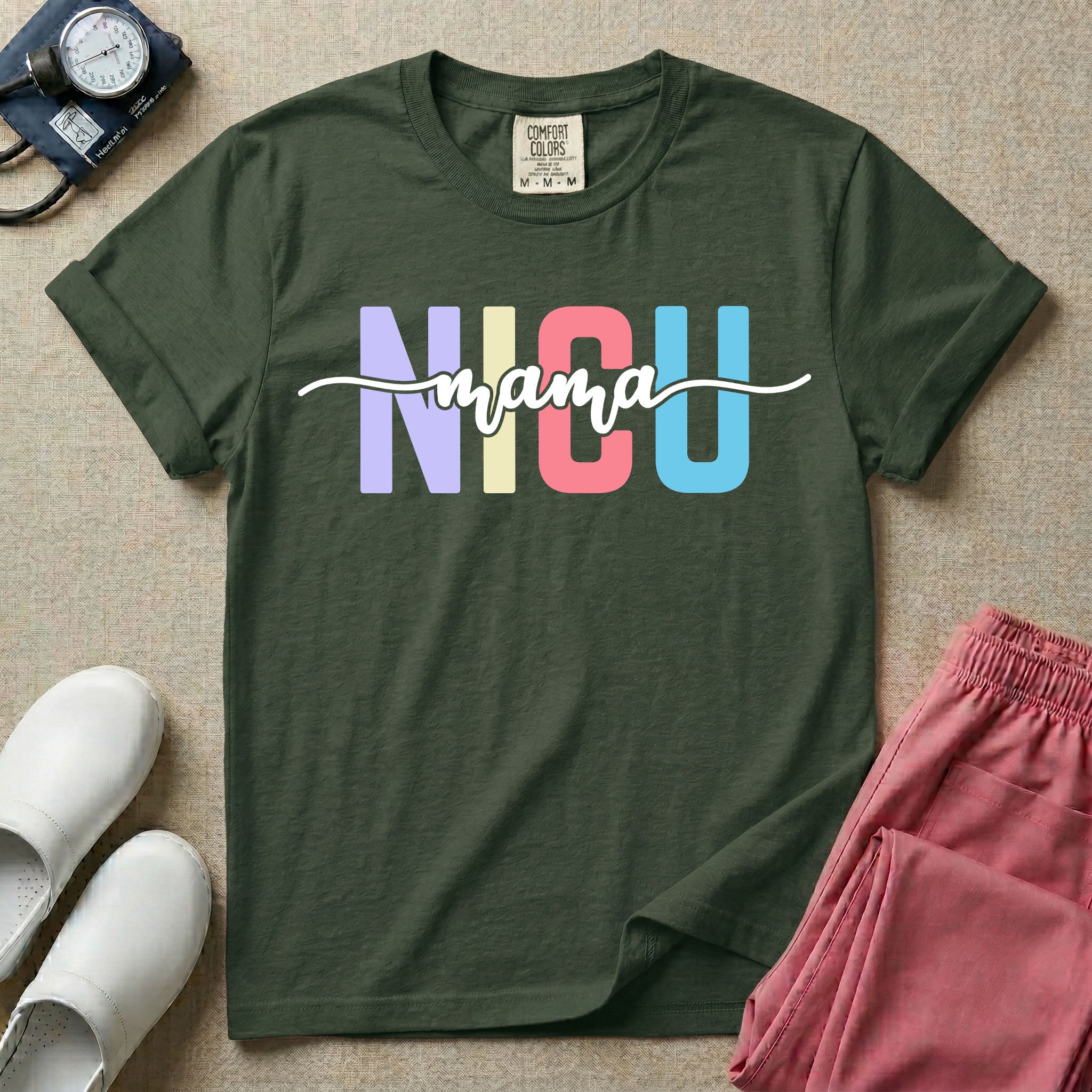 A graphic for the Neonatal Intensive Care Unit featuring the word 'NICU' in large, colorful pastel block letters with the word 'mama' written in a flowing white cursive font across the center.