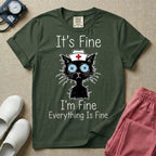 General nursing t-shirt featuring a humorous graphic of a frazzled black cat wearing a medical cross nurse cap alongside the text "It's Fine I'm Fine Everything Is Fine".