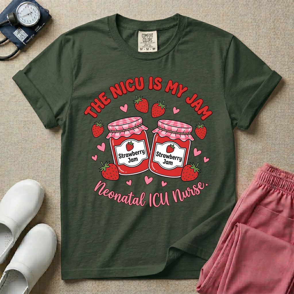 A t-shirt featuring two jars of strawberry jam surrounded by small hearts and strawberries with the text THE NICU IS MY JAM arched above and Neonatal ICU Nurse written in a retro script below.