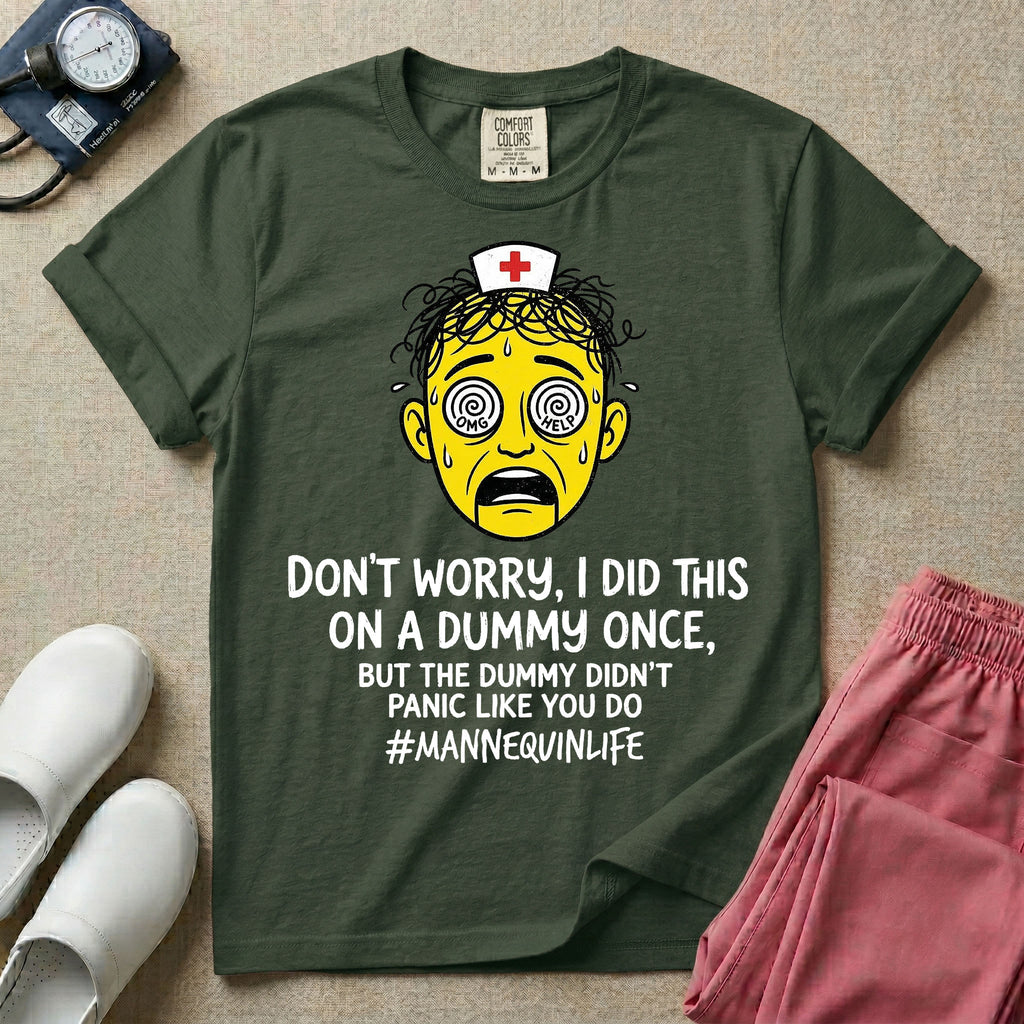 General nursing nurse t-shirt with a funny don't worry I did this on a mannequin once but the dummy didn't panic like you do graphic in moss color.