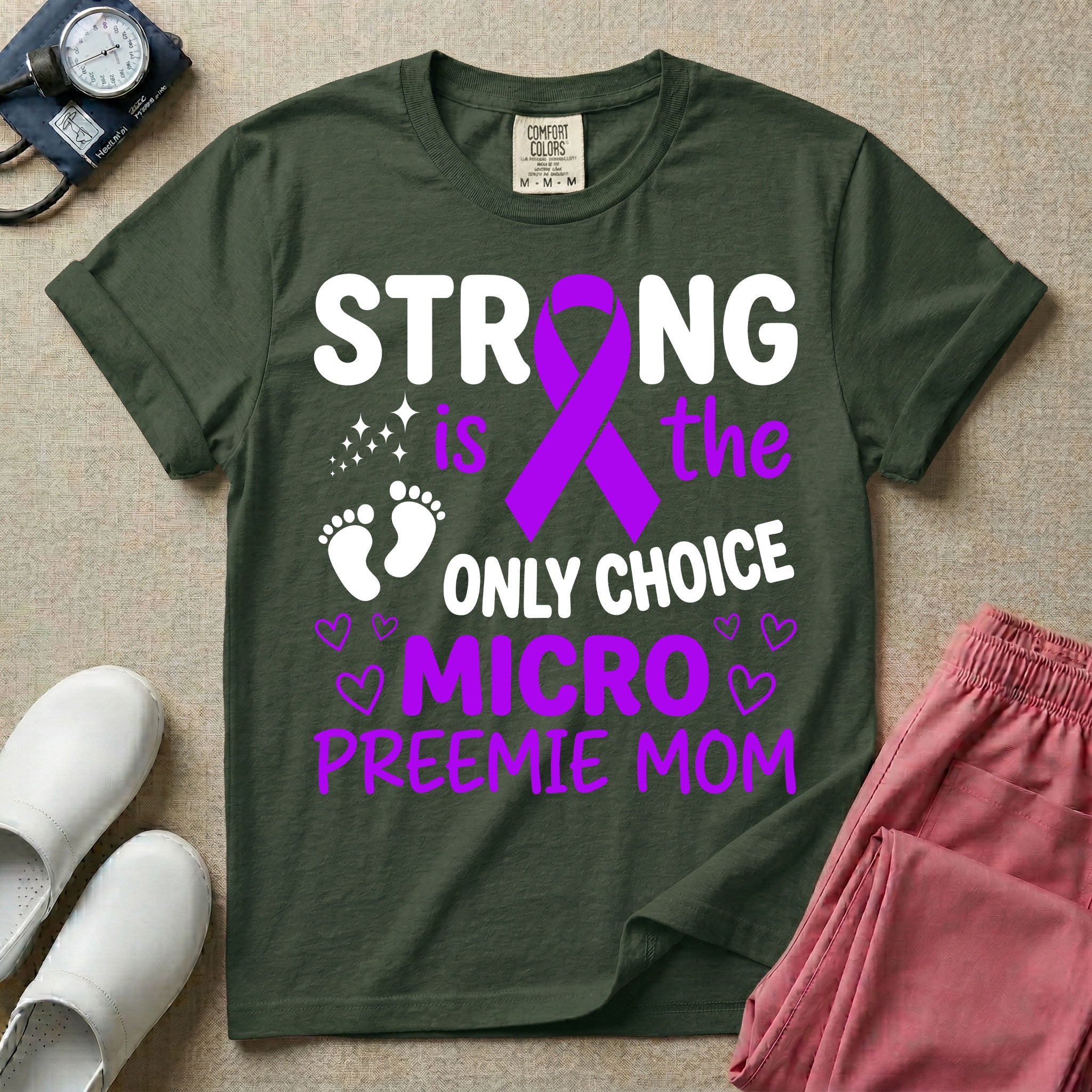 A graphic for the Neonatal Intensive Care Unit featuring the text 'STRONG is the ONLY CHOICE' stacked above 'MICRO PREEMIE MOM', incorporating a large purple awareness ribbon, tiny baby footprints, and small purple outline hearts.